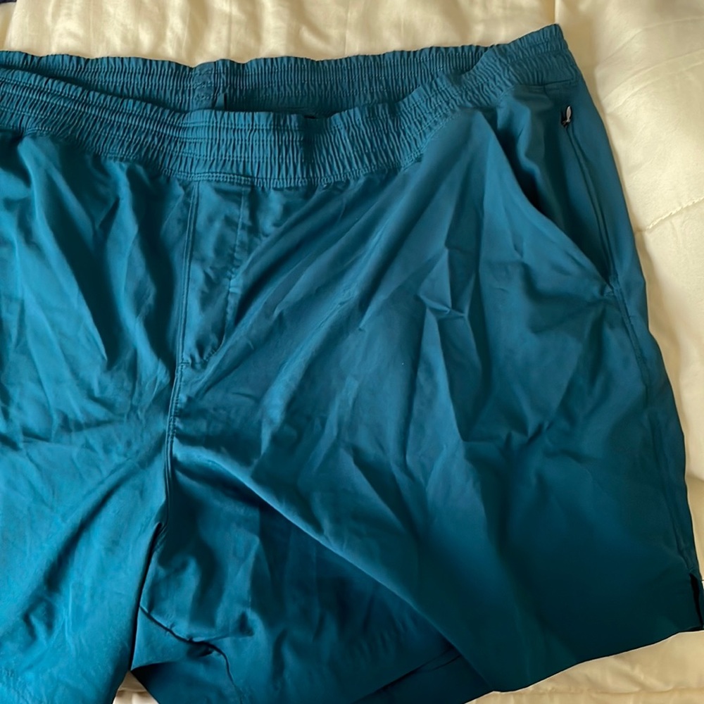 3X Green swim trunks